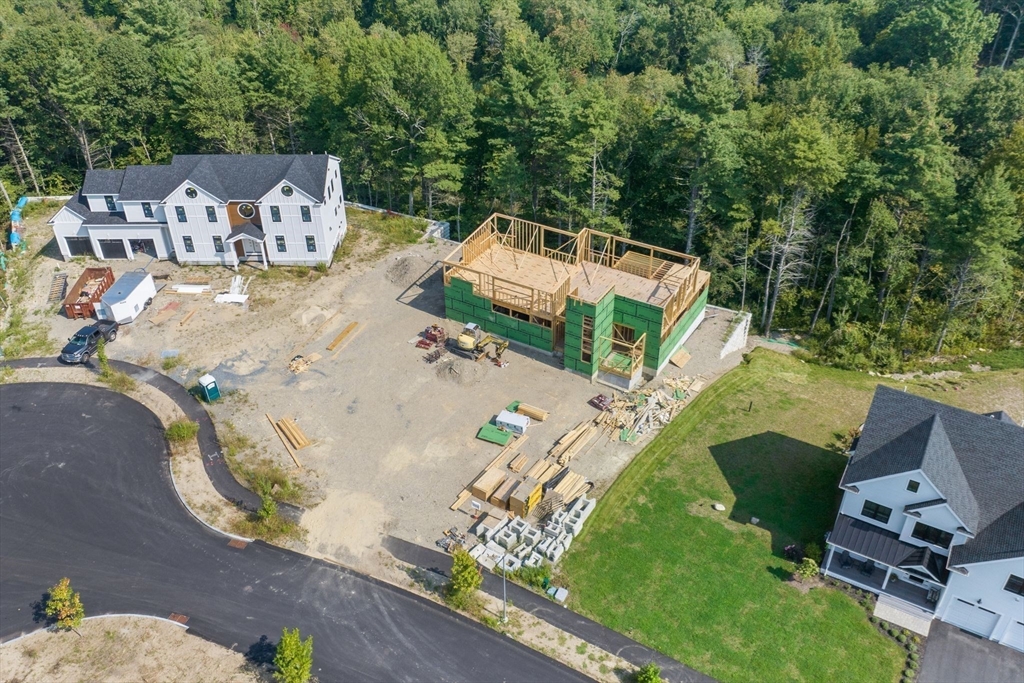 25 Holly Way Canton, MA 02021 - Photo 10 of 25 an aerial view of a house with a yard