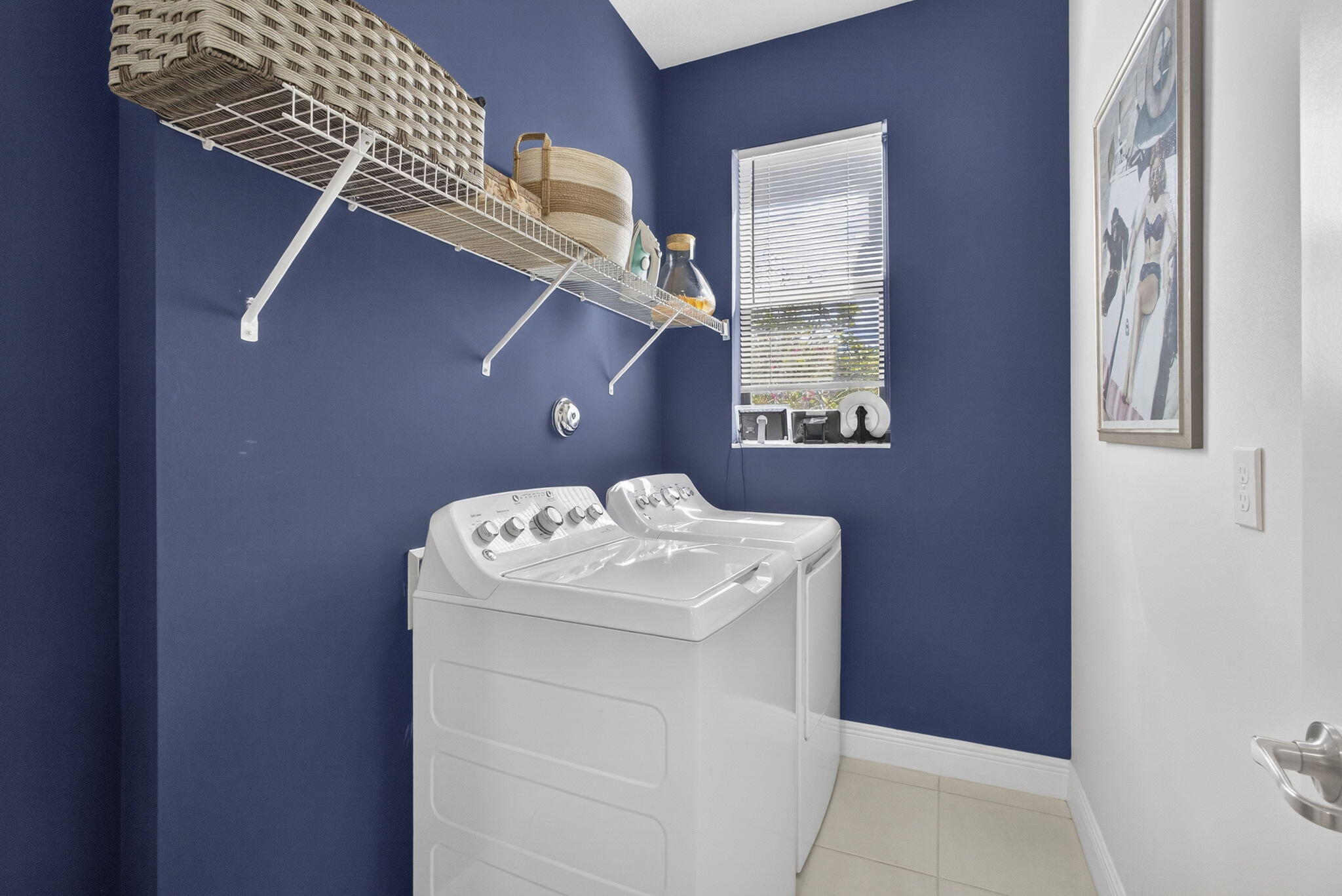 5563 Starfish Road Westlake, FL 33470 - Photo 13 of 22 Large Laundry Room with Room for Storage