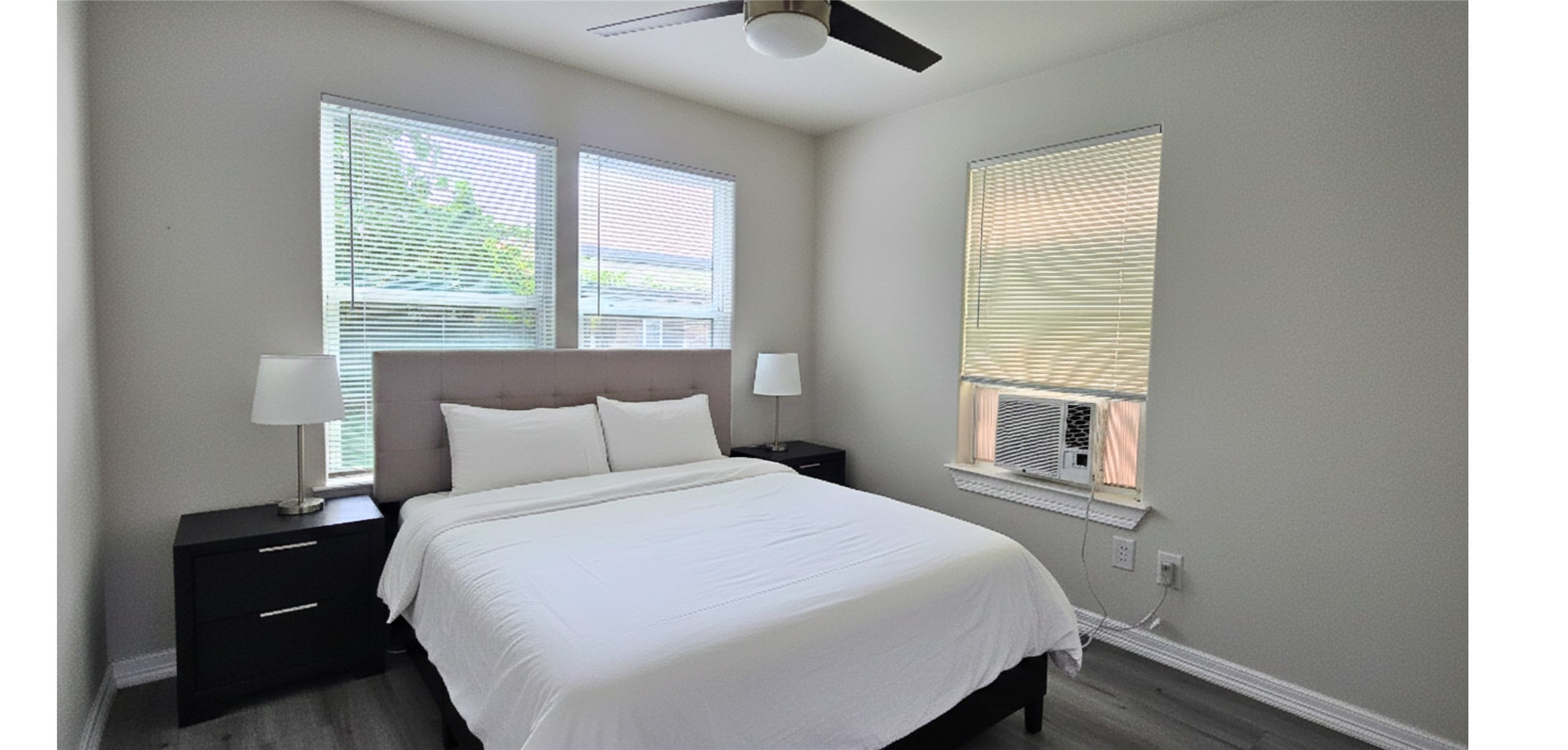 3610 Tuam Street Houston, TX 77004 - Photo 5 of 7 a bedroom with a bed and a window