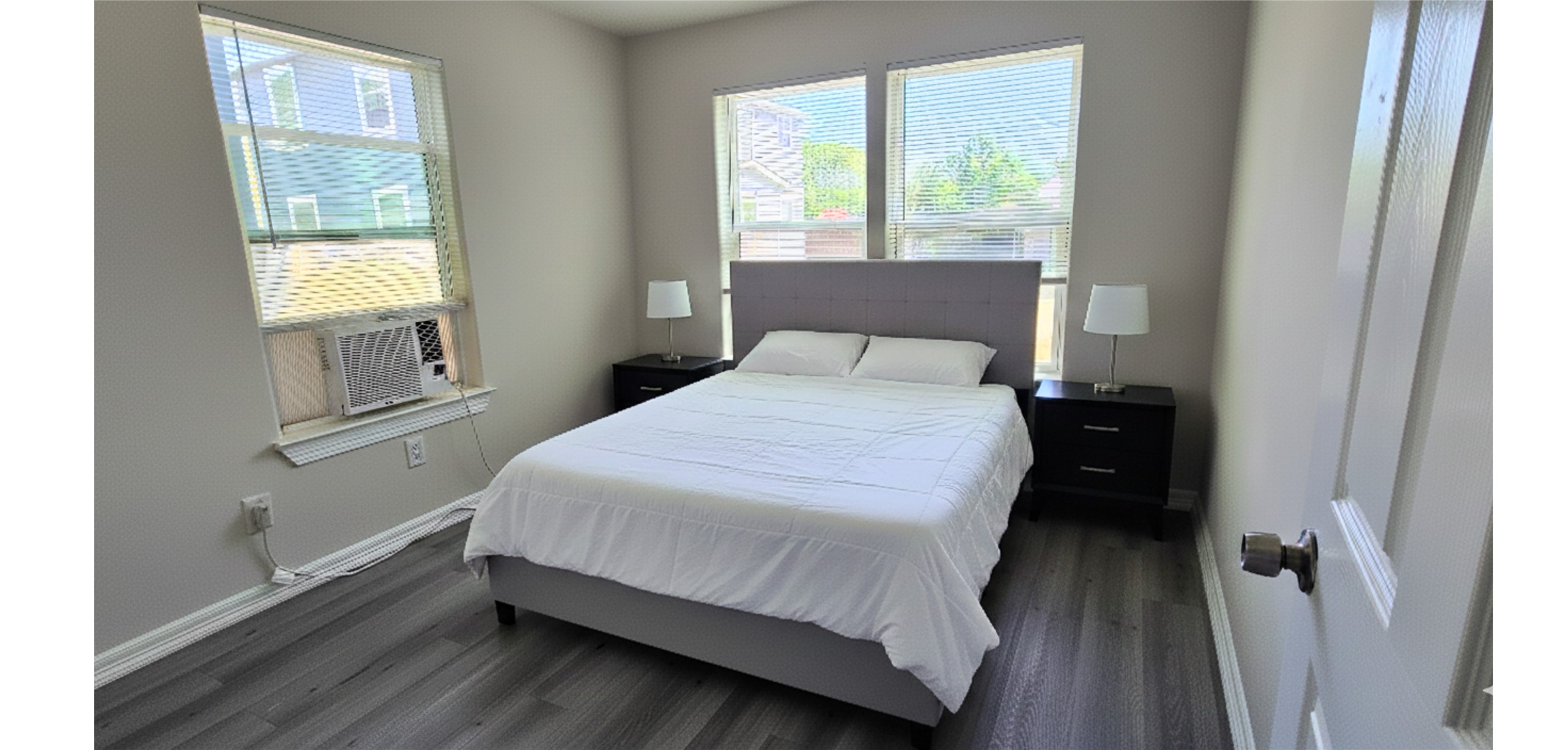 3610 Tuam Street Houston, TX 77004 - Photo 6 of 7 a bedroom with a bed and a window