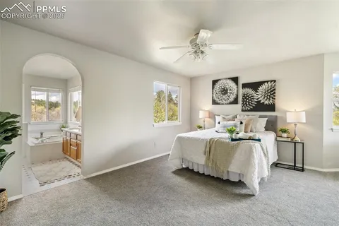 a kitchen with stainless steel appliances granite countertop a sink a stove and a microwave