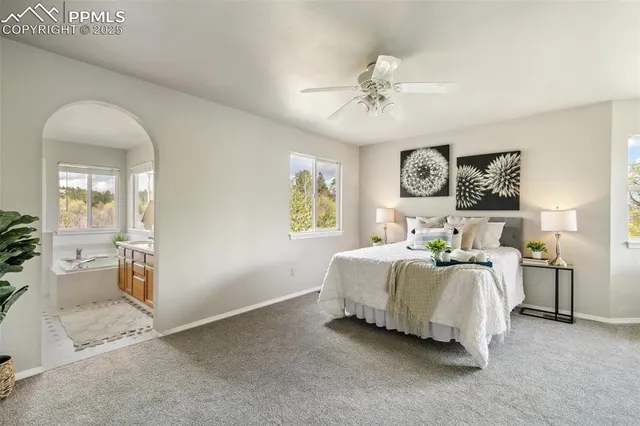 a kitchen with stainless steel appliances granite countertop a sink a stove and a microwave