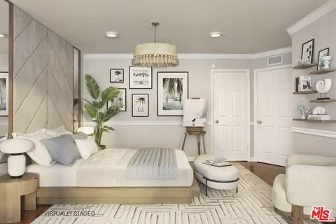 a spacious bedroom with a bed and a couch