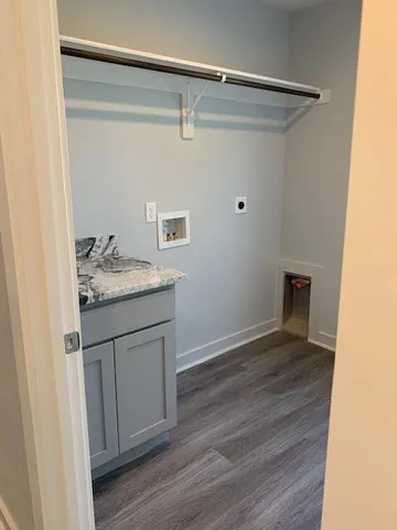 a hallway with wooden floor