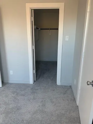 an empty room with closet