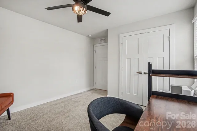 front view of a house with a patio