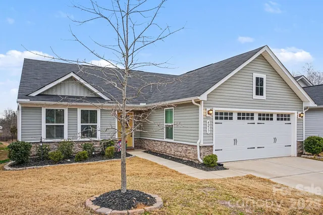 a front view of a house with a patio