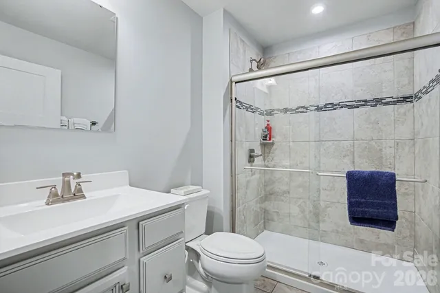 a living room with furniture window and a flat screen tv