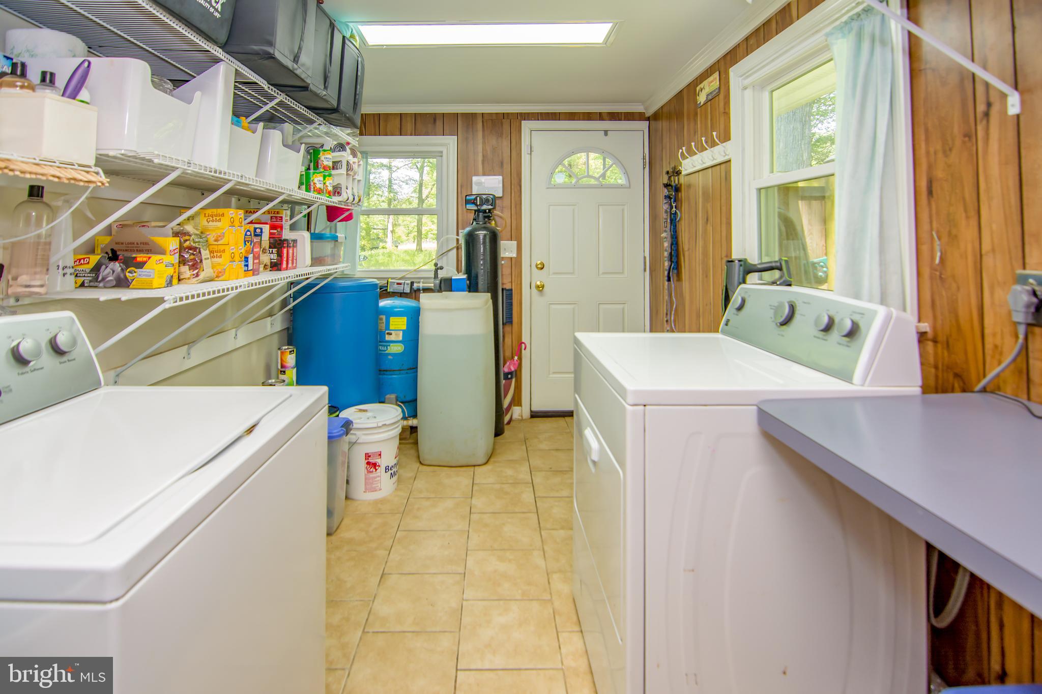 1664 Snug Harbor Road Shady Side, MD 20764 - Photo 20 of 58 Laundry room/Mud Room - Side door driveway