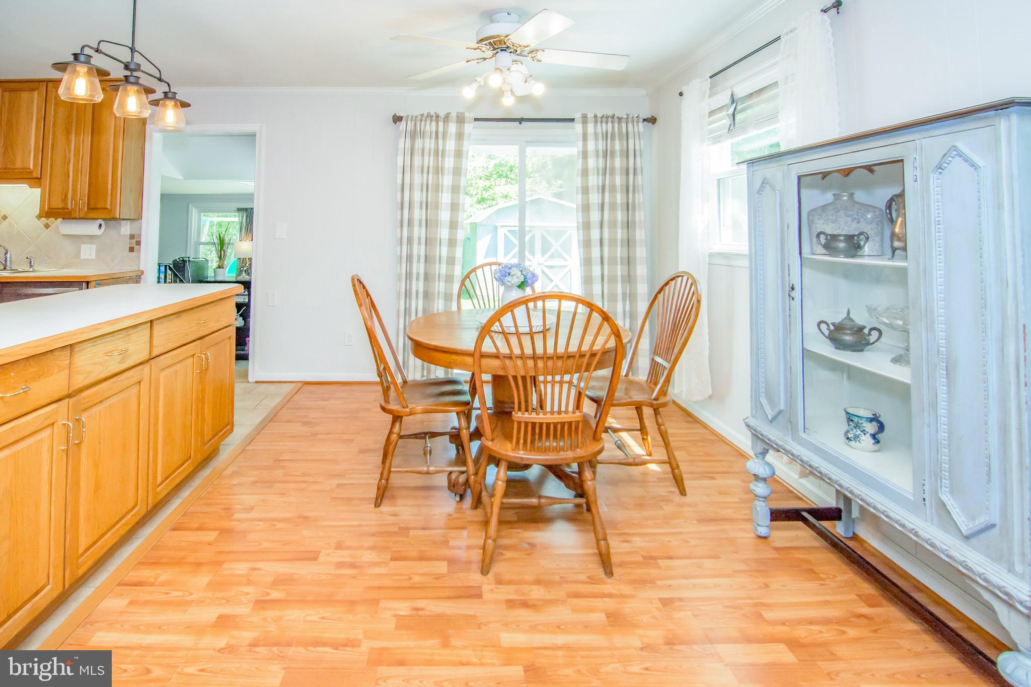 1664 Snug Harbor Road Shady Side, MD 20764 - Photo 7 of 58 Dining Room with Sliders to rear yard.