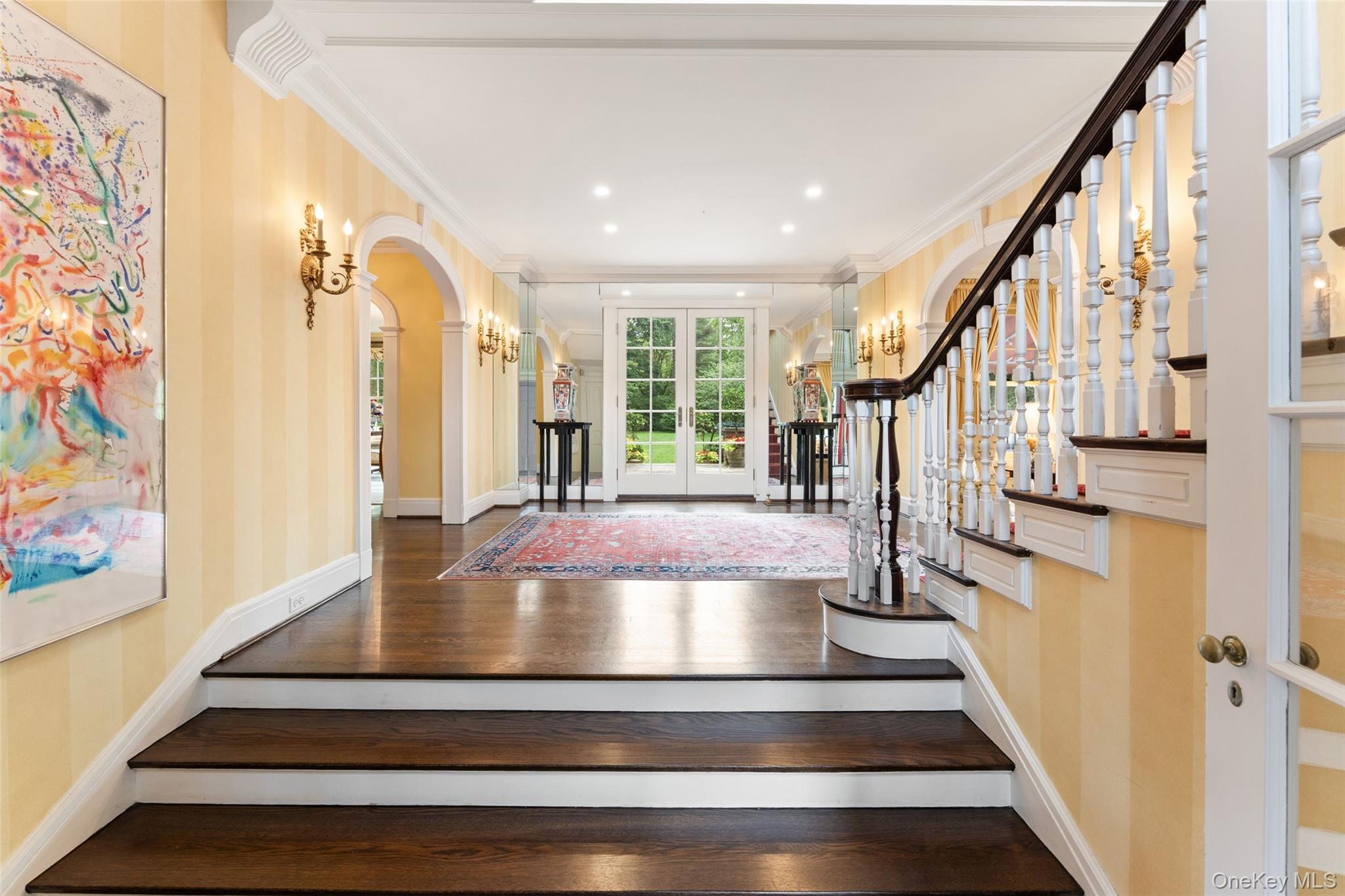 21 Dolma Road Scarsdale, NY 10583 - Photo 3 of 46 Grand entry foyer with french doors leading to backyard