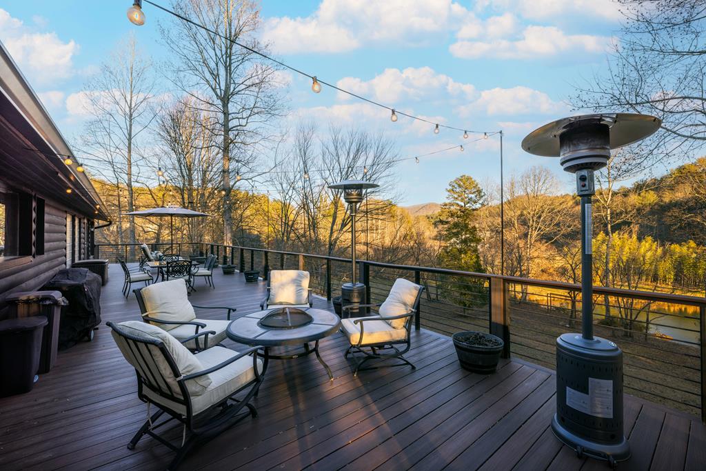 3800 Cutcane Road Mineral Bluff, GA 30559 - Photo 59 of 68 a view of a chairs and table in backyard