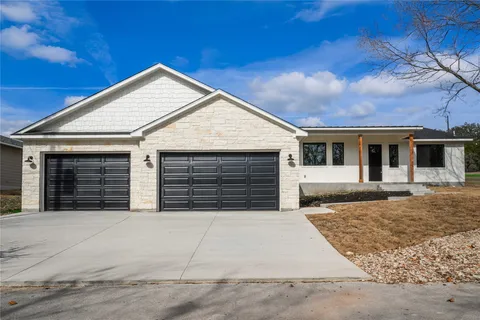 front view of a house and a yard