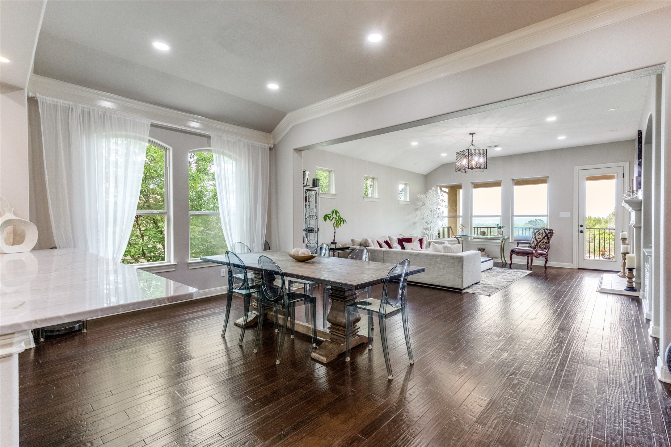 2312 Rivina Drive Austin, TX 78733 - Photo 19 of 40 Dining area featuring tons of natural light, ornamental molding