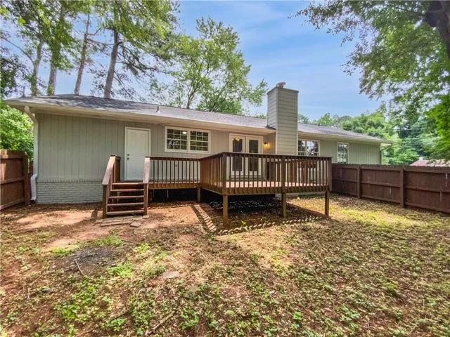 a house view with a garden space
