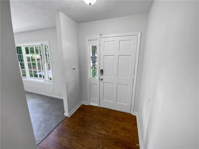 an empty room with windows