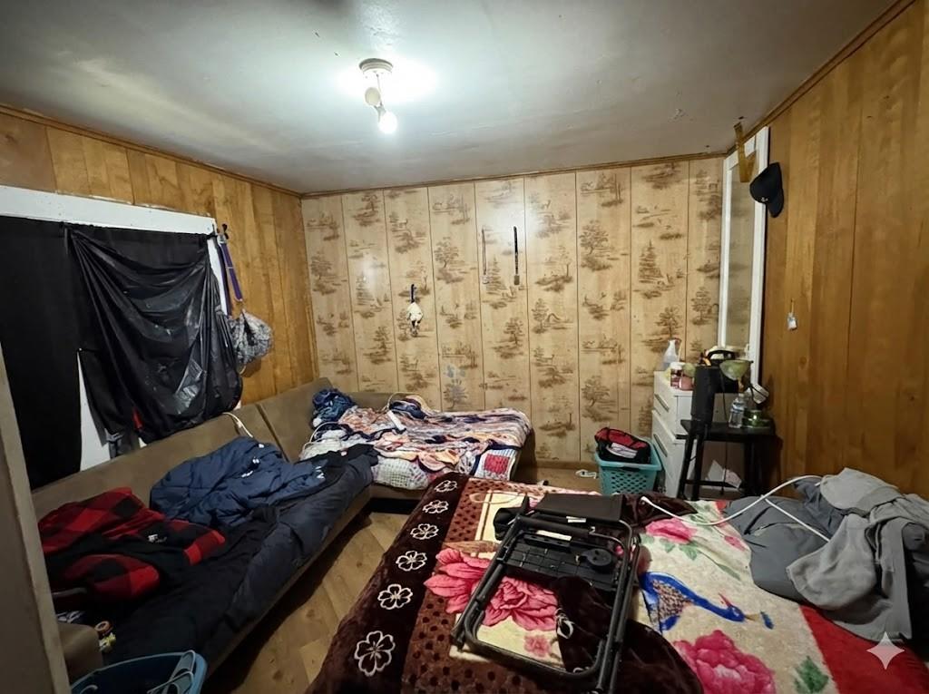 710 Shawnee Street Graham, TX 76450 - Photo 6 of 15 a room with furniture and a flat screen tv