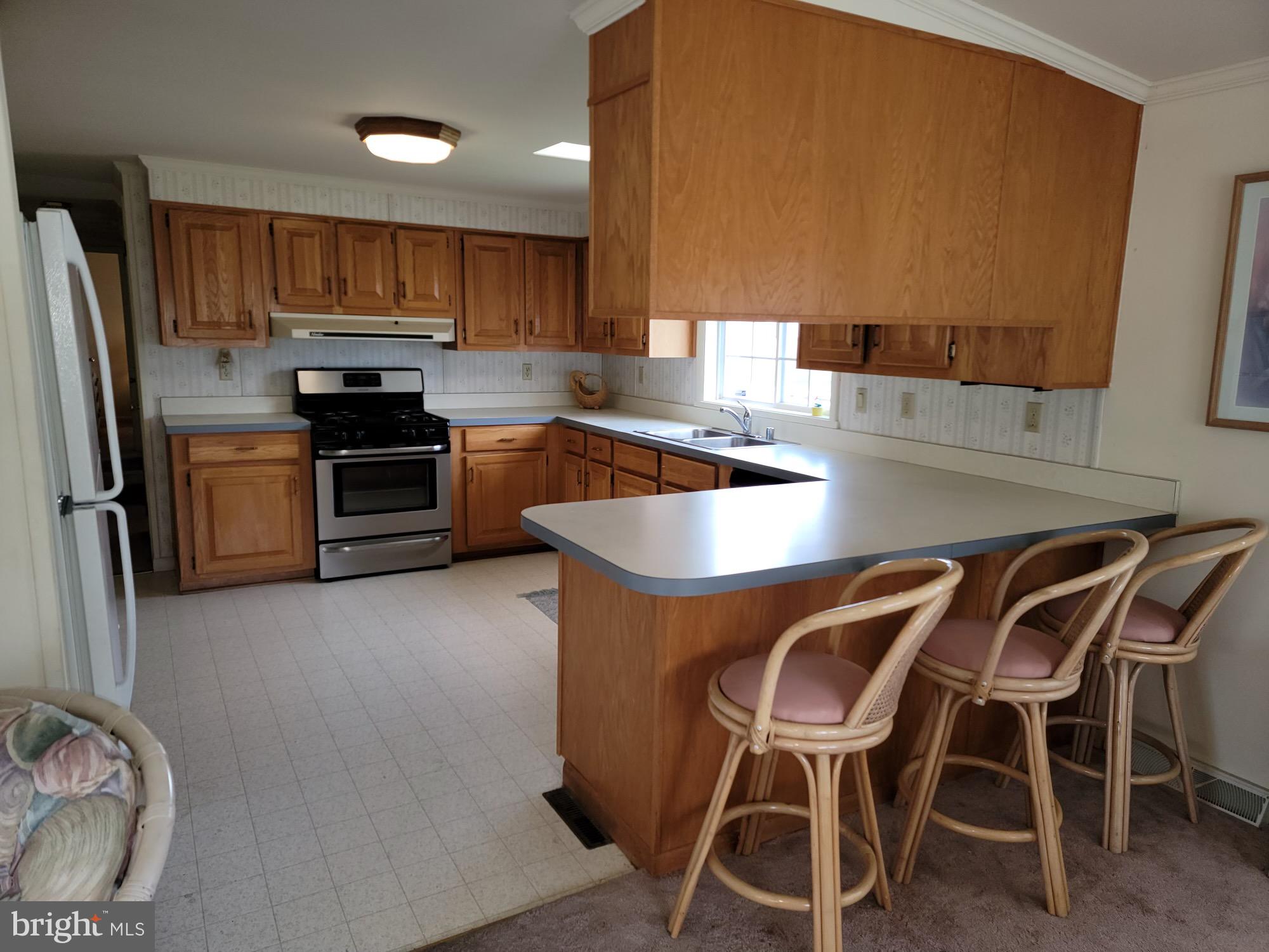 30950 Maplewood Road Ocean View, DE 19970 - Photo 14 of 28 Kitchen/Bar Area
