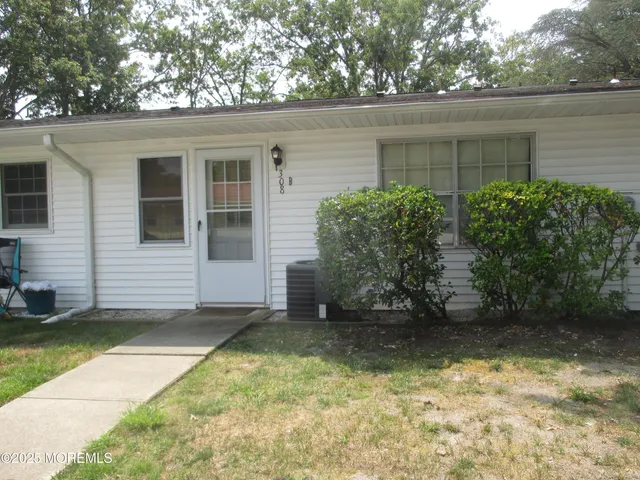 a view of a backyard of the house
