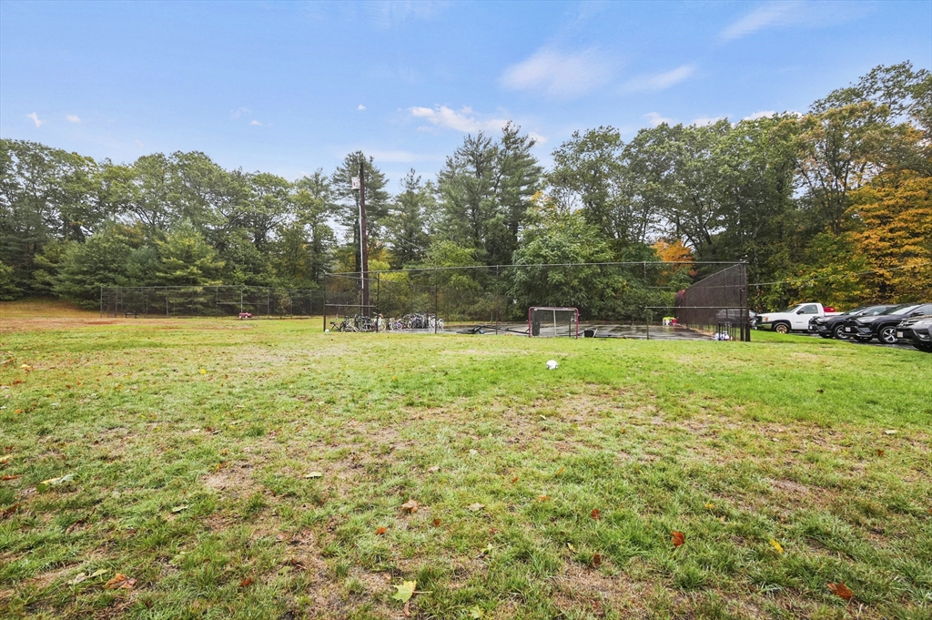 132 Parker Street, Unit G5 Acton, MA 01720 - Photo 20 of 22 a view of a field with tree in the background