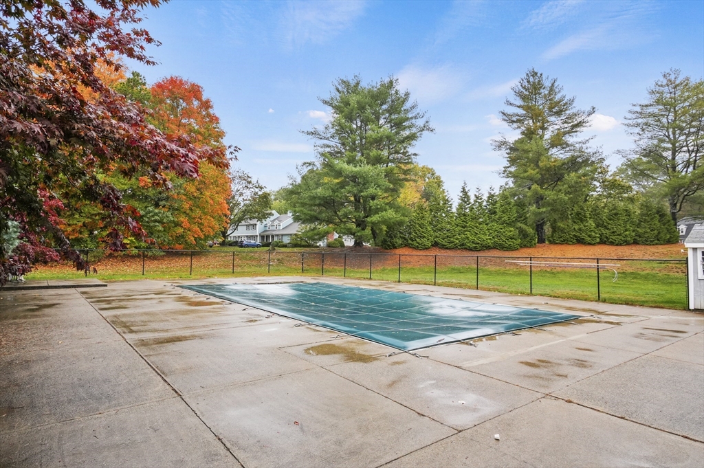 132 Parker Street, Unit G5 Acton, MA 01720 - Photo 21 of 22 a view of an outdoor space and swimming pool