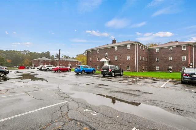 a view of street with parked cars