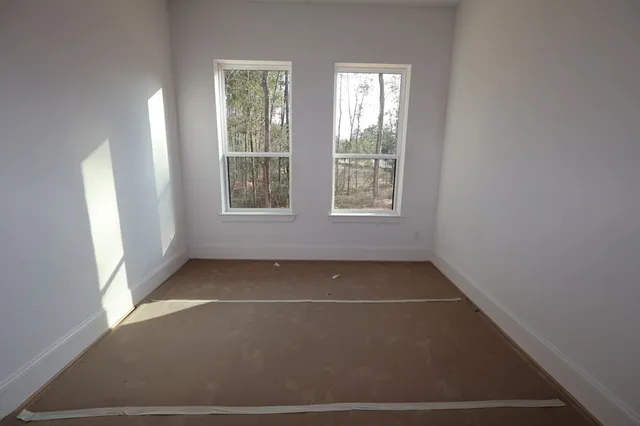 a view of a room that has a window in it