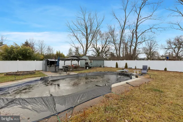 a view of a swimming pool with an outdoor space