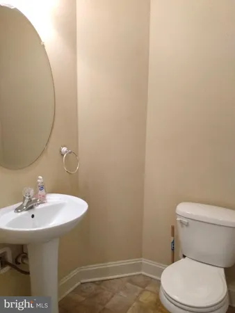 a bathroom with a sink and a toilet
