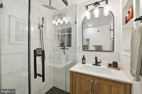 a view of a hallway with washer and dryer