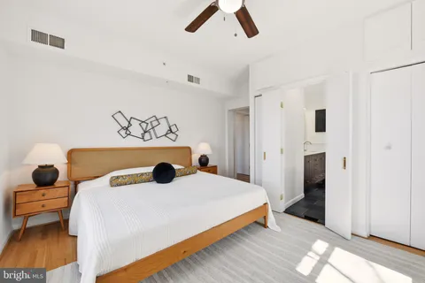 a room with furniture and a large window