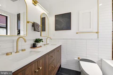 a bathroom with a sink and bathtub