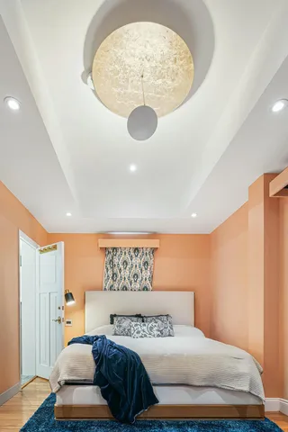 a front view of a house with flowers