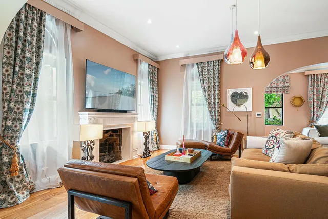 a view of a dining room with furniture and window