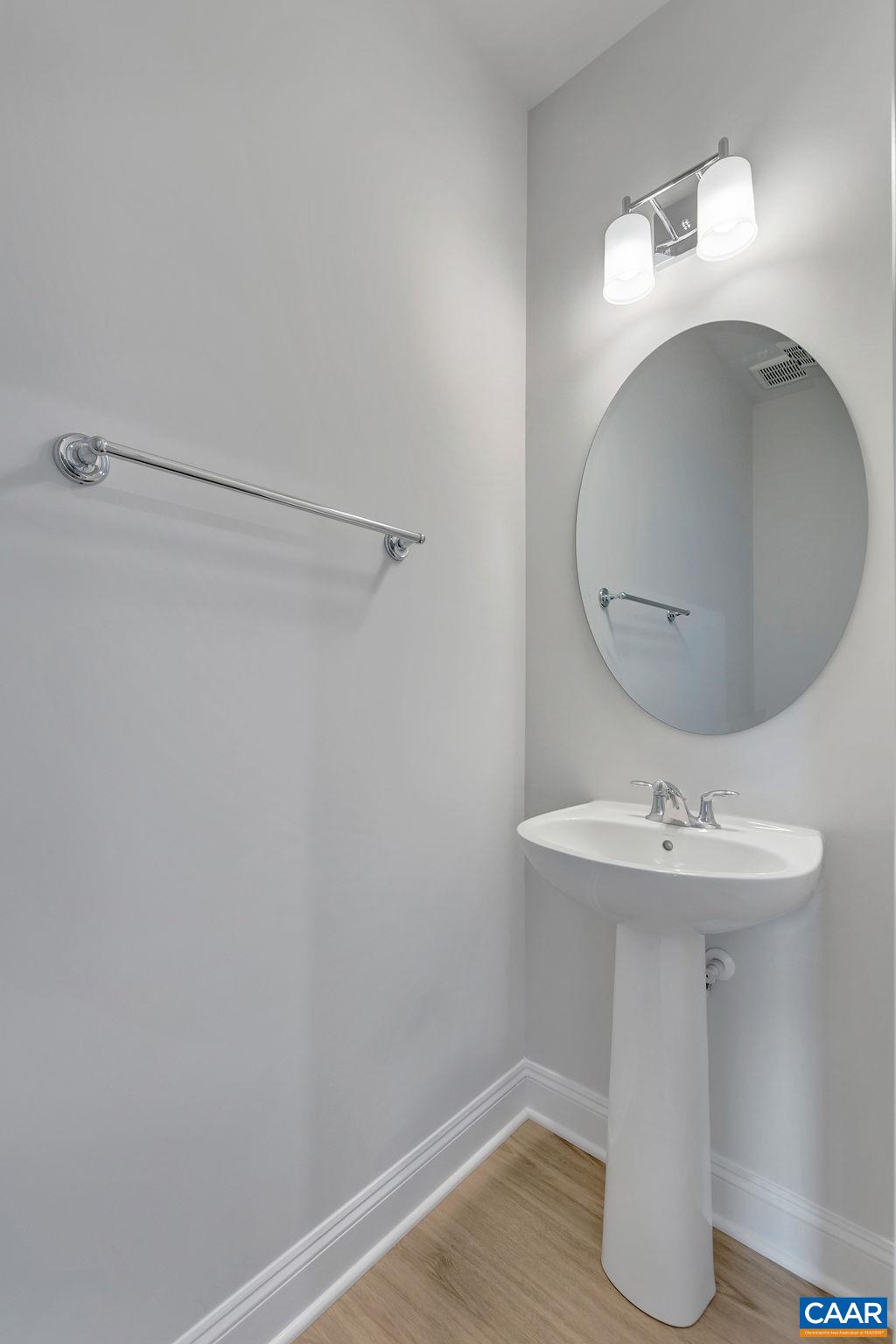 3059 Rambling Brk Lane Crozet, VA 22932 - Photo 13 of 30 a bathroom with a sink and mirror