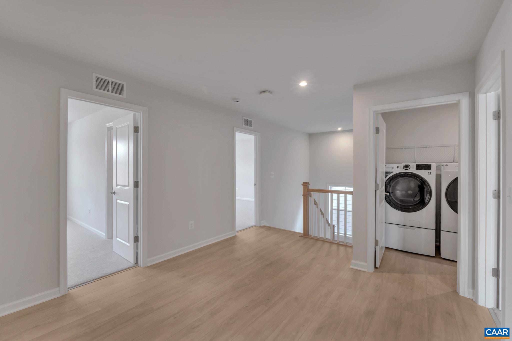 3059 Rambling Brk Lane Crozet, VA 22932 - Photo 14 of 30 a view of a hallway with washer and dryer