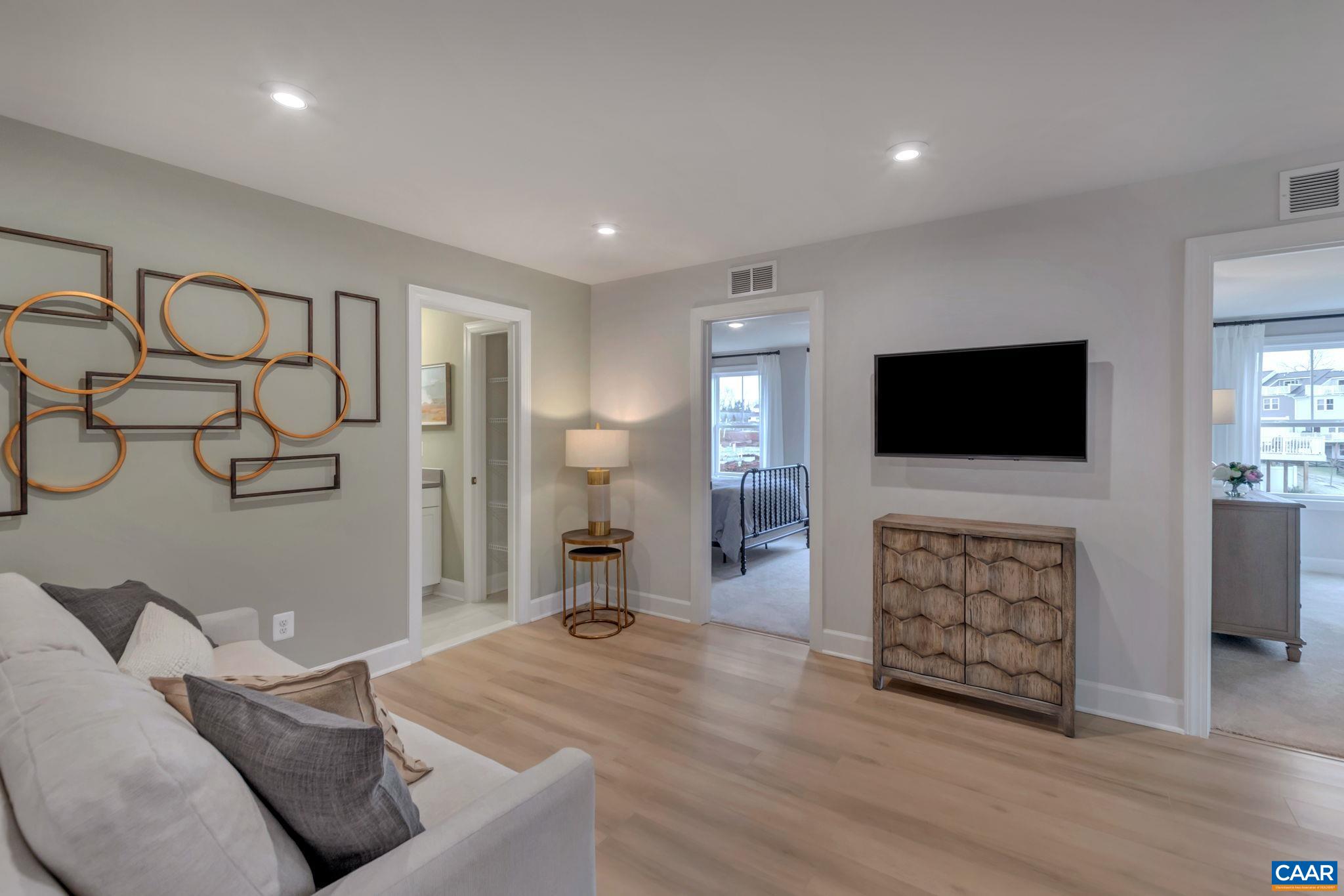 3059 Rambling Brk Lane Crozet, VA 22932 - Photo 17 of 30 a living room with furniture and a flat screen tv