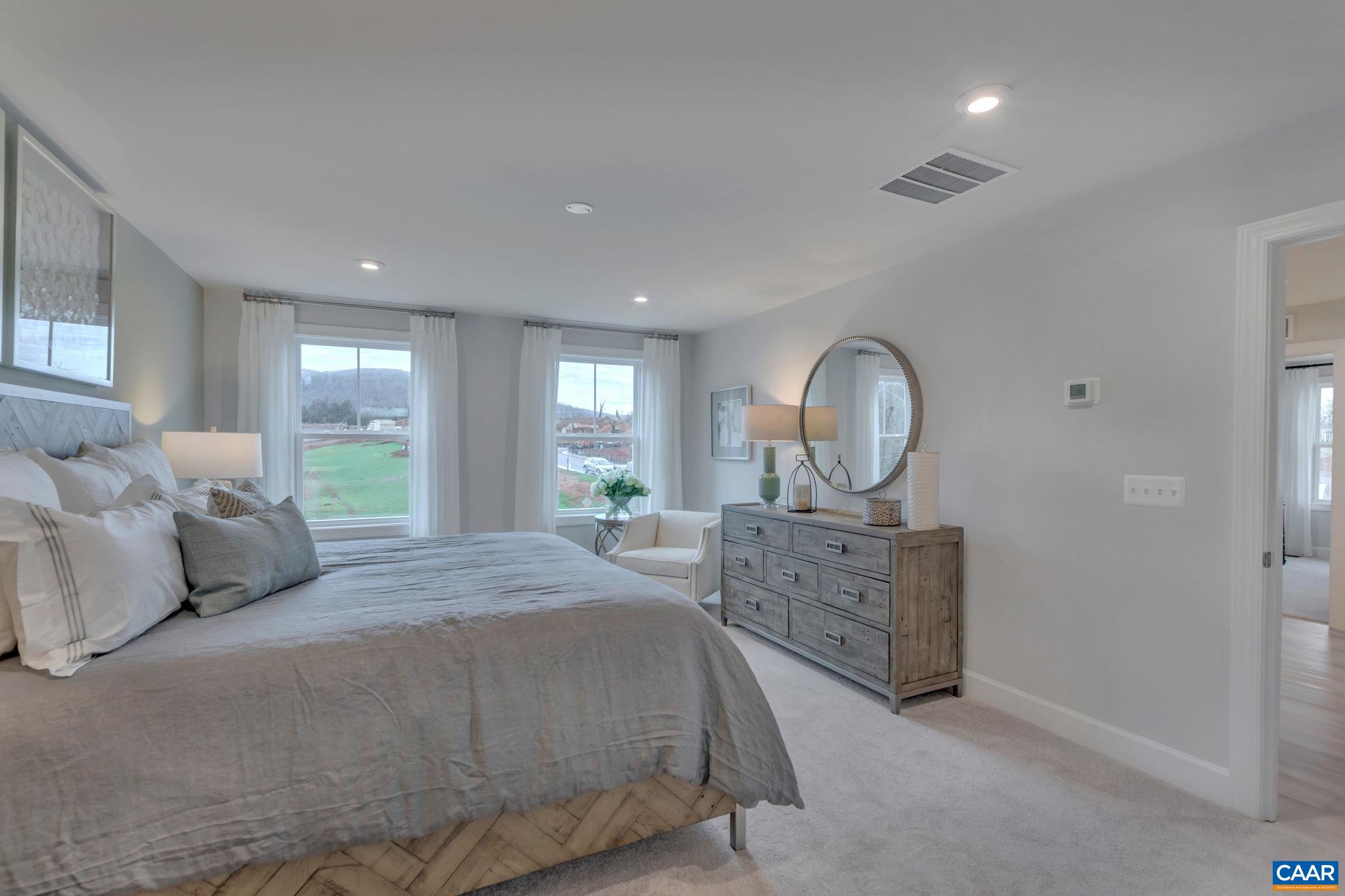 3059 Rambling Brk Lane Crozet, VA 22932 - Photo 19 of 30 a bed room with a bed and a dresser