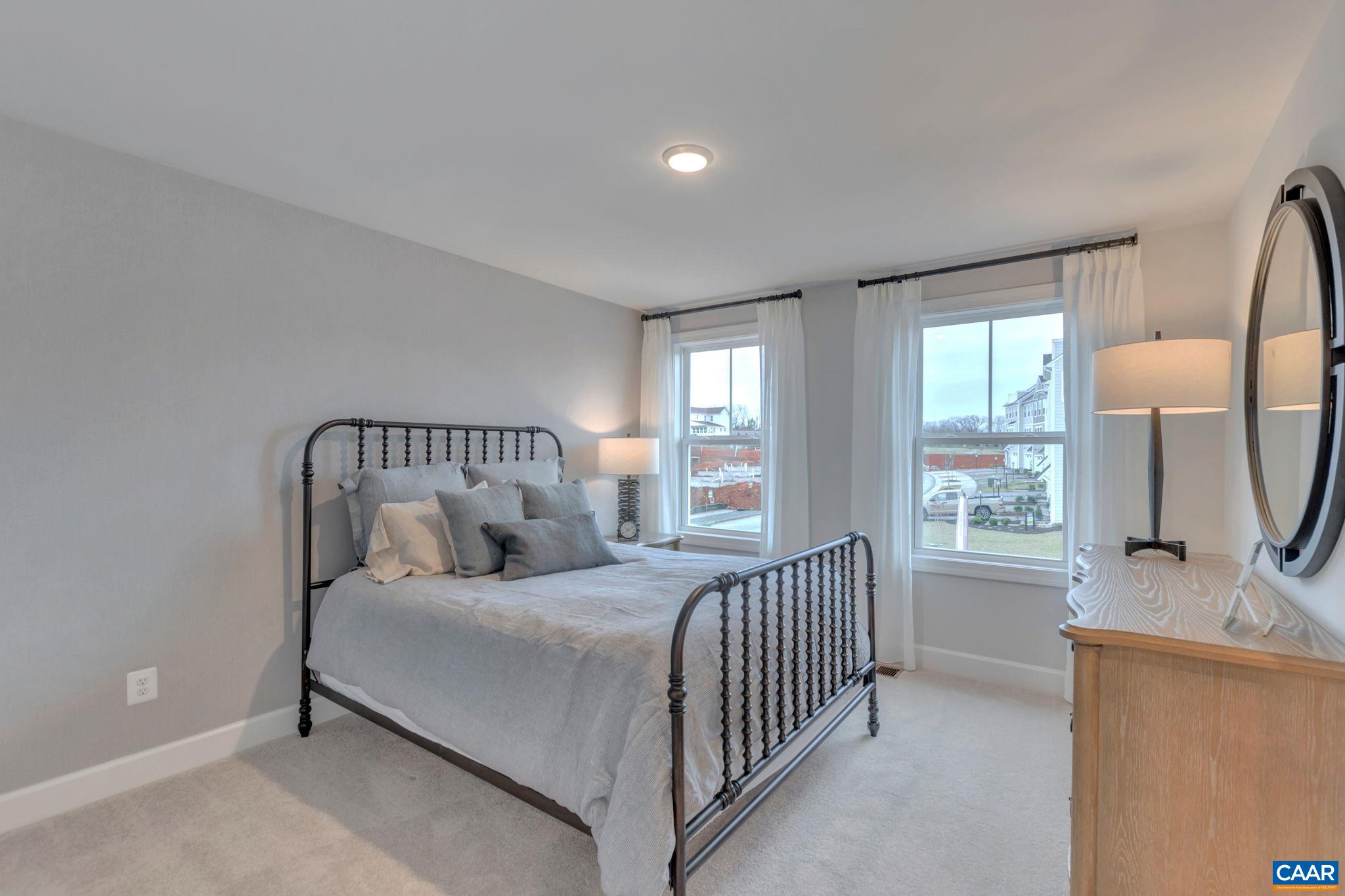 3059 Rambling Brk Lane Crozet, VA 22932 - Photo 25 of 30 a bedroom with a bed and a window