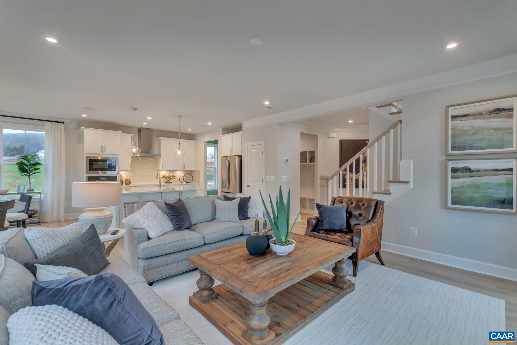 3059 Rambling Brk Lane Crozet, VA 22932 - Photo 6 of 30 a living room with furniture kitchen view and a wooden floor