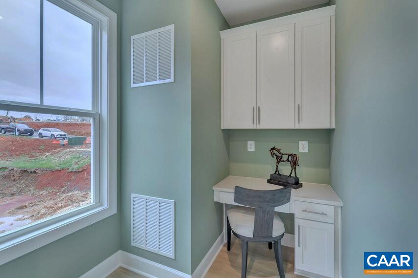 3059 Rambling Brk Lane Crozet, VA 22932 - Photo 8 of 30 a view of a kitchen area with furniture and wooden floor