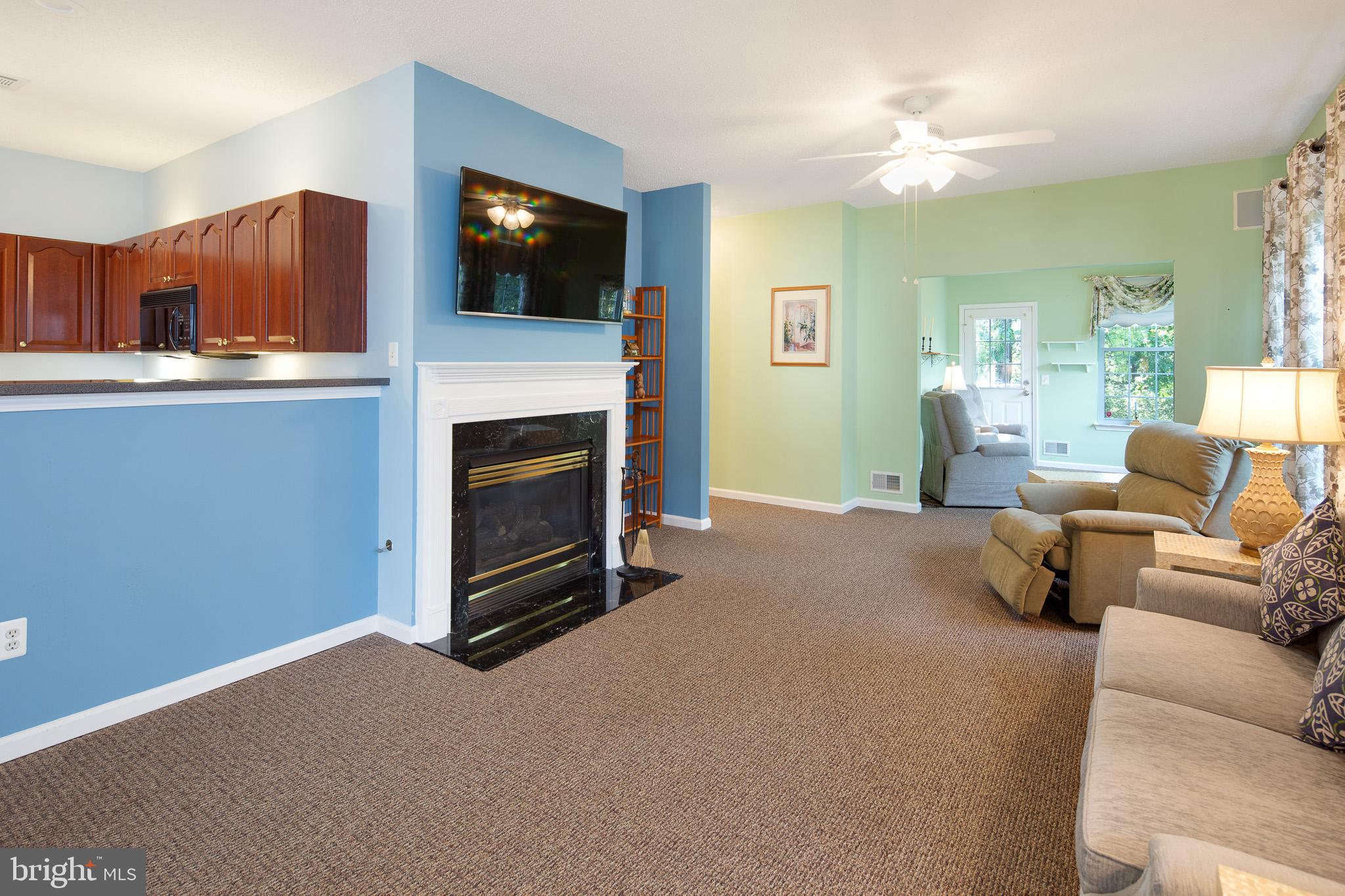 65 Quail Road Barnegat, NJ 08005 - Photo 13 of 34 family room with a fireplace