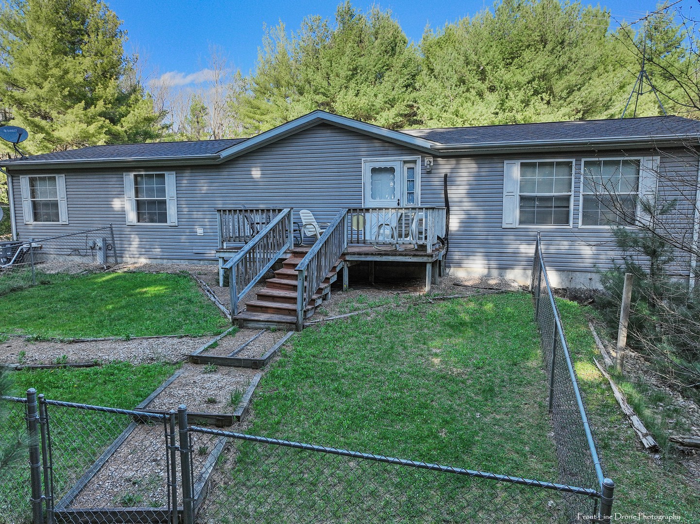 614 Morgan Road Amboy, IL 61310 - Photo 1 of 18 a backyard of a house with seating space