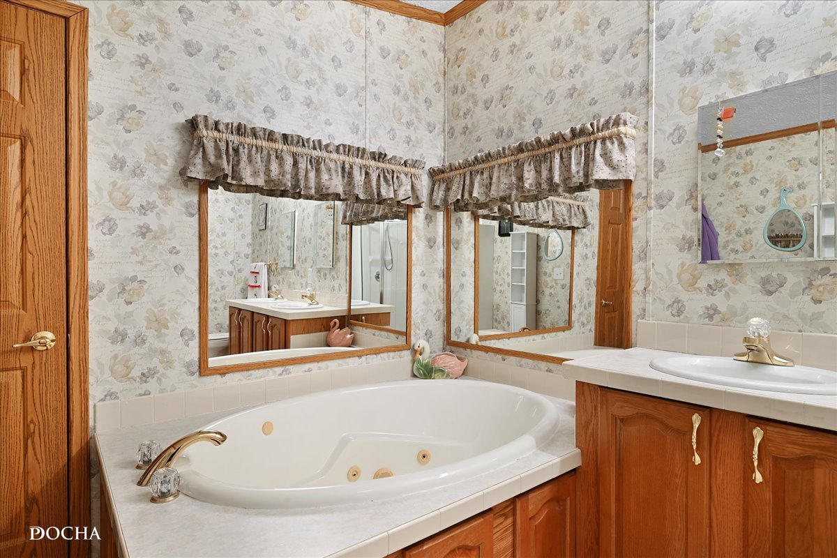 614 Morgan Road Amboy, IL 61310 - Photo 8 of 18 a bathroom with a bathtub and a sink