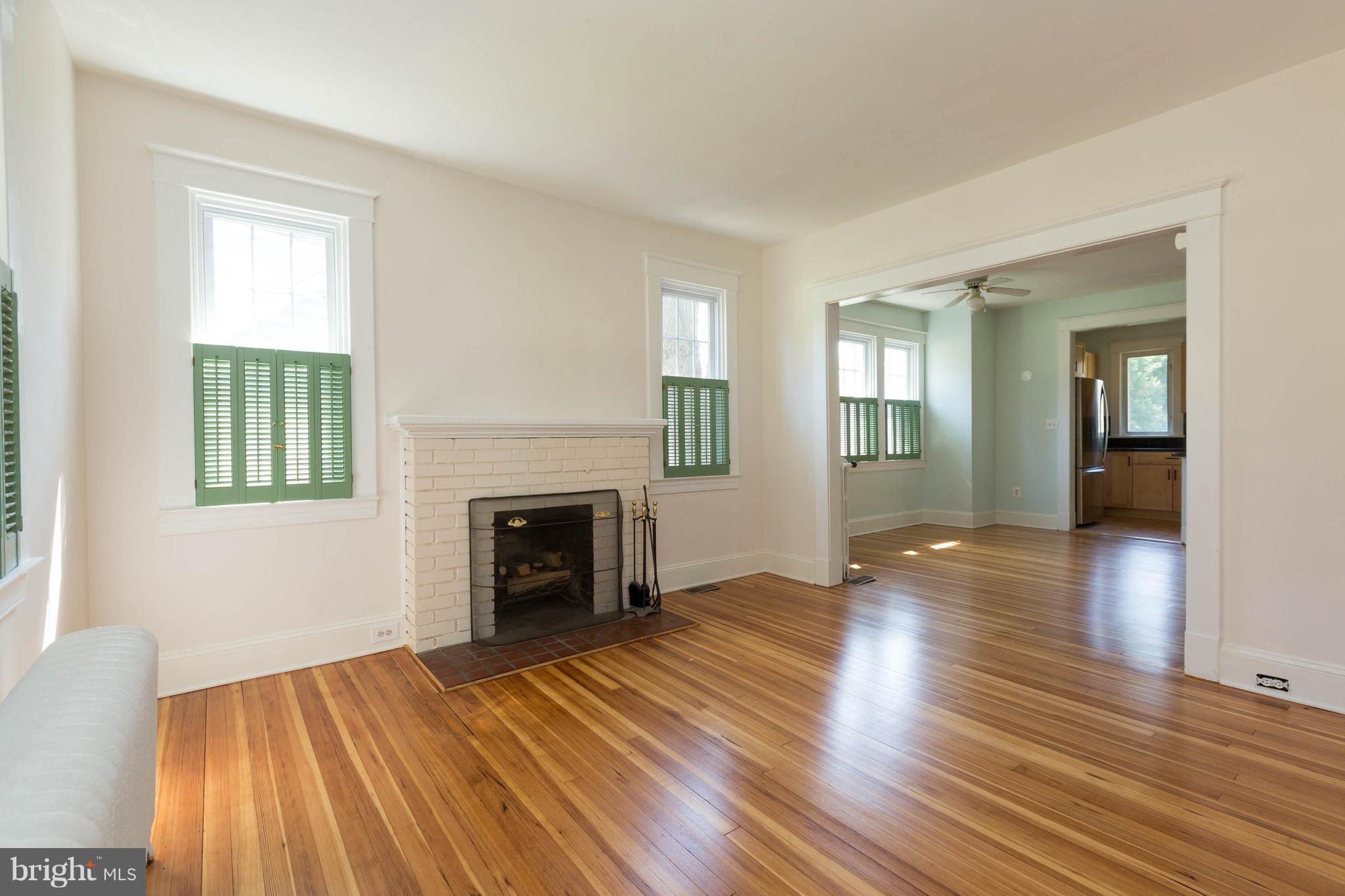 2219 Crest Road Baltimore, MD 21209 - Photo 3 of 30 Living Room with wood burning fireplace