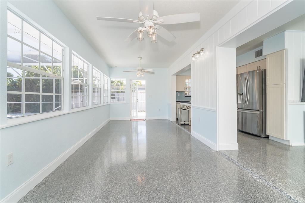 2835 North Beach Road, Unit A Englewood, FL 34223 - Photo 11 of 58 a view of an empty room with a window