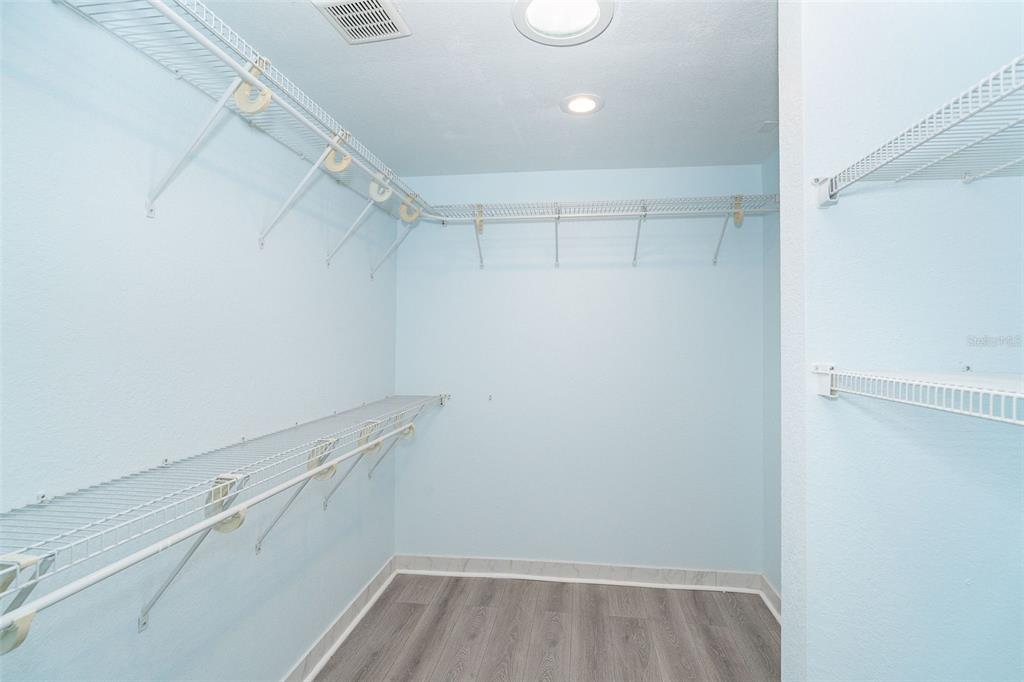 2835 North Beach Road, Unit A Englewood, FL 34223 - Photo 21 of 58 a view of a room with racks on the wall