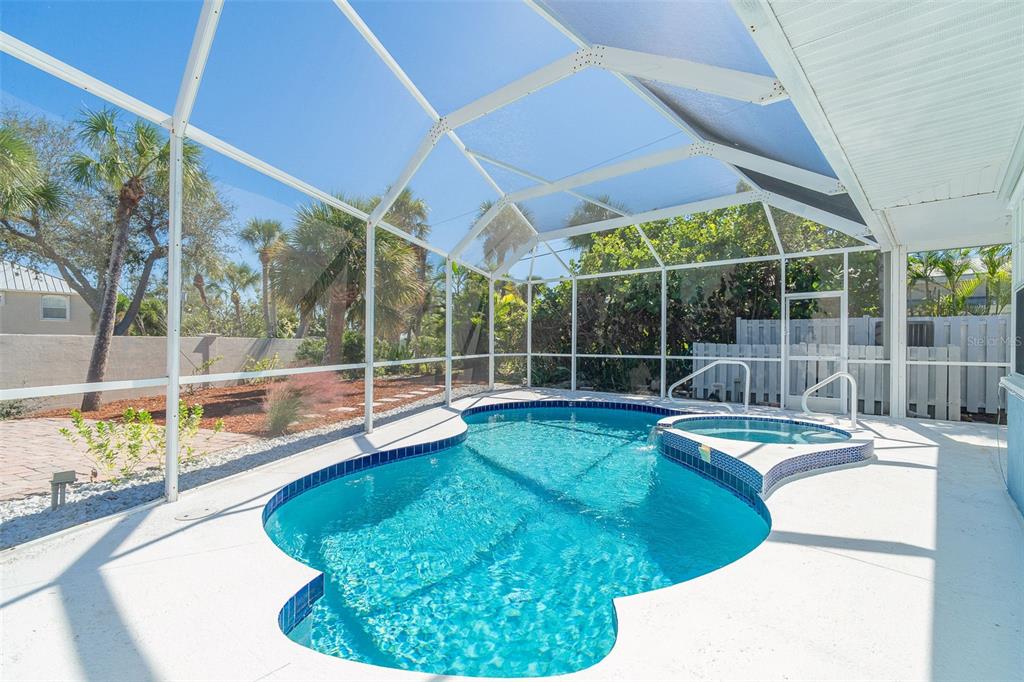 2835 North Beach Road, Unit A Englewood, FL 34223 - Photo 36 of 58 a view of a house with swimming pool