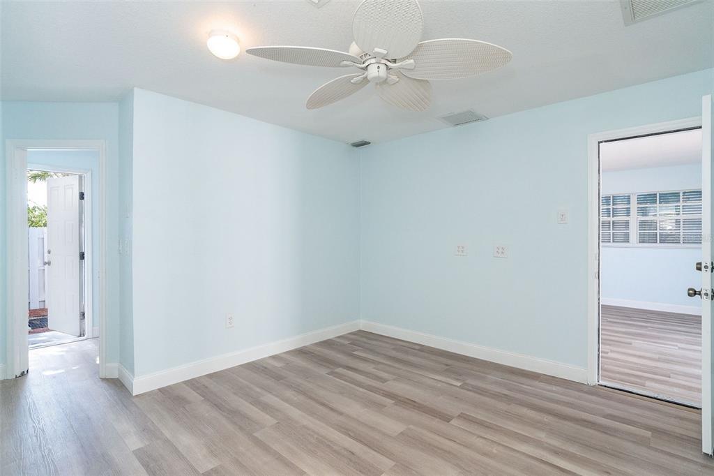 2835 North Beach Road, Unit A Englewood, FL 34223 - Photo 44 of 58 wooden floor in an empty room