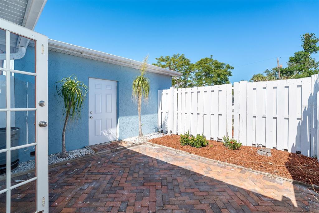 2835 North Beach Road, Unit A Englewood, FL 34223 - Photo 49 of 58 a backyard of a house